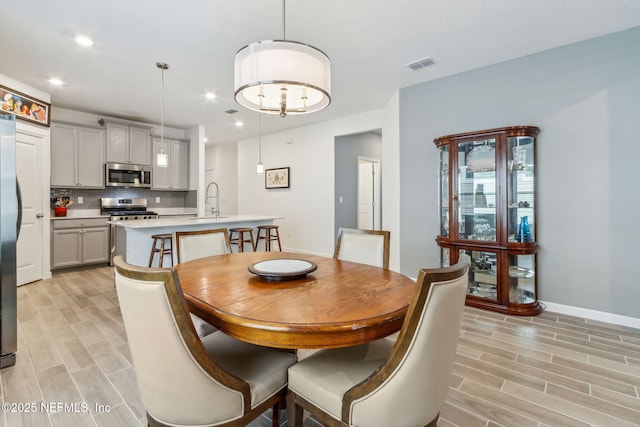 dining space with sink