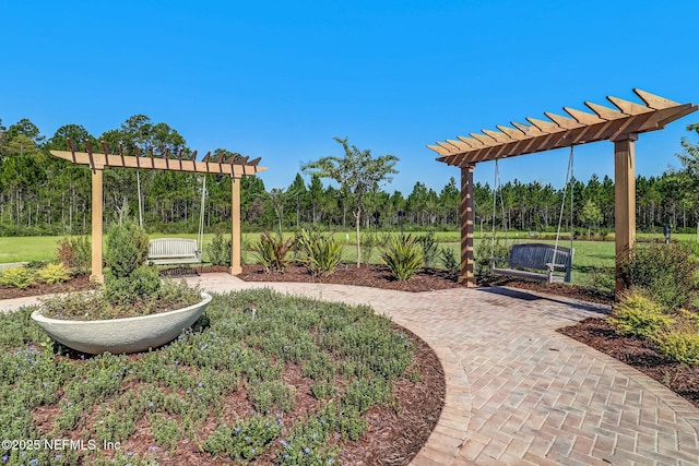 view of yard with a pergola