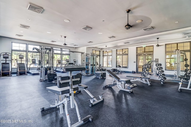 workout area featuring french doors and ceiling fan