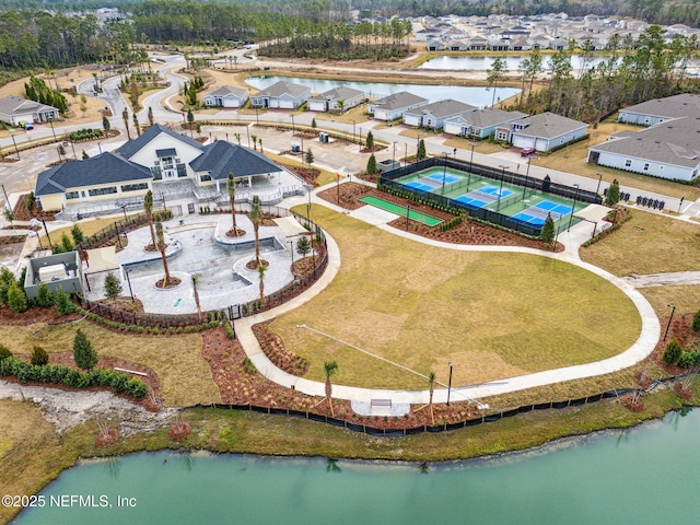 bird's eye view with a water view