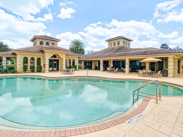 view of pool with a patio