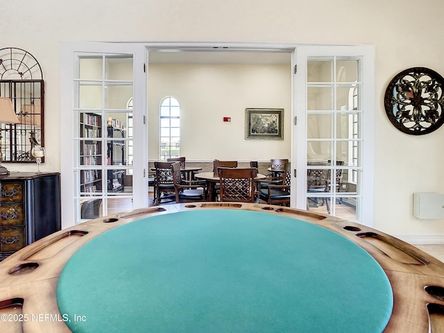 game room featuring french doors