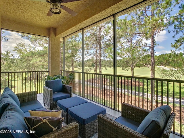 sunroom / solarium with ceiling fan and plenty of natural light