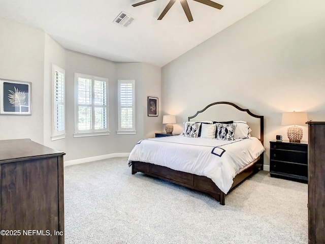 carpeted bedroom with ceiling fan and lofted ceiling