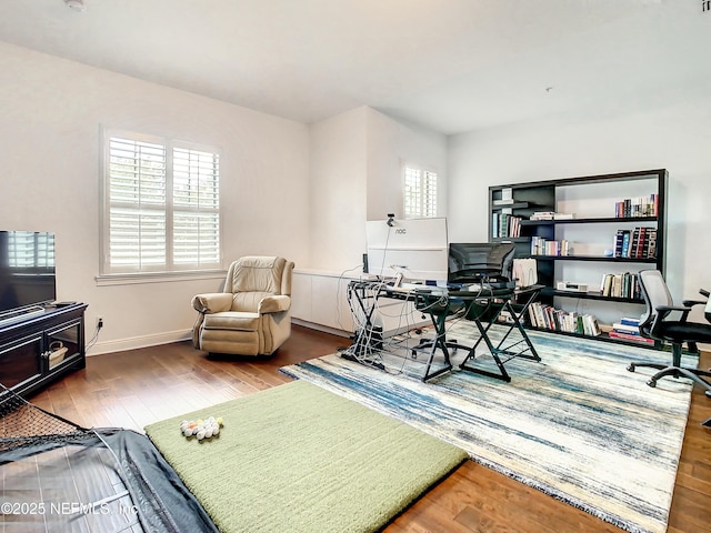 office area with hardwood / wood-style floors