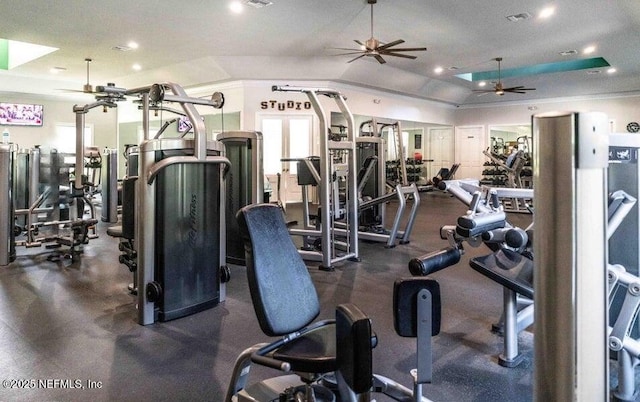 workout area with vaulted ceiling and ceiling fan