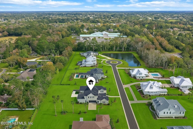 179 Coastal Grove Ct, Ponte Vedra Beach, FL 32082 - aerial view of residential area with a large body of water and a heavily wooded area
