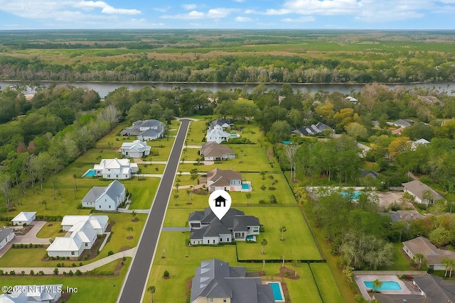 179 Coastal Grove Ct, Ponte Vedra Beach, FL 32082 - aerial view of residential area with a forest and a nearby body of water