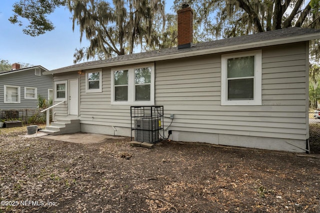 back of house featuring a patio area