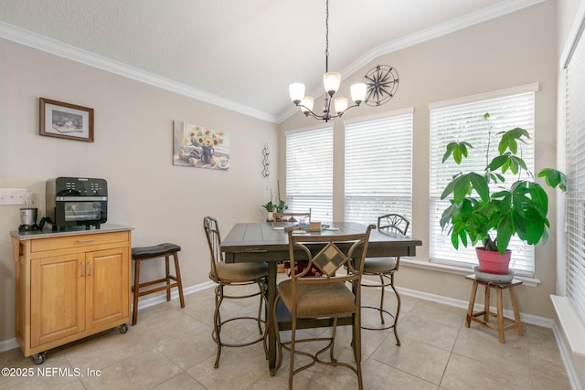 dining area featuring a notable chandelier, lofted ceiling, crown molding, and light tile patterned floors