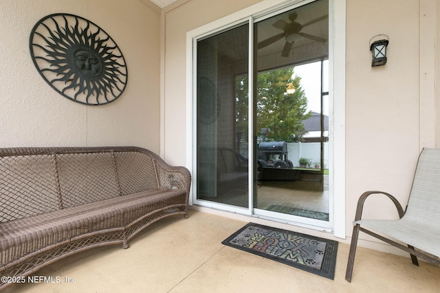 entrance to property featuring a patio