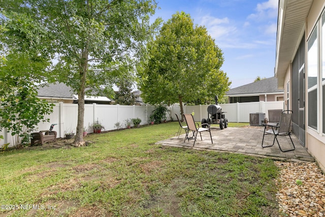 view of yard with a patio and cooling unit