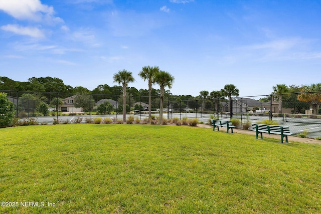 view of yard featuring tennis court