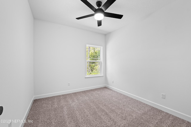 unfurnished room featuring carpet flooring and ceiling fan