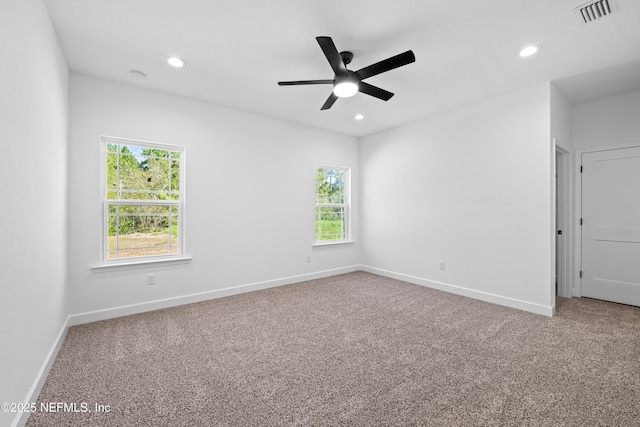 carpeted empty room with ceiling fan