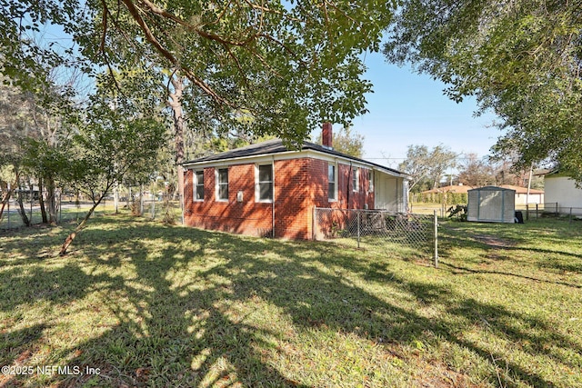 view of outdoor structure with a yard