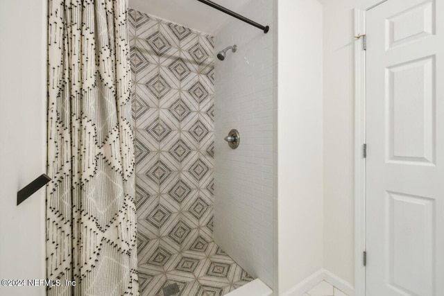 bathroom with curtained shower