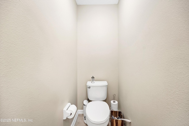 bathroom featuring toilet