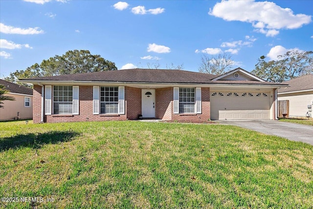 single story home featuring a garage and a front yard