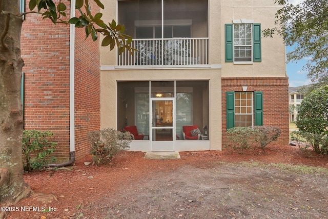 property entrance with a balcony