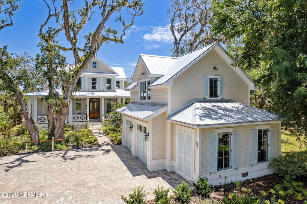 view of front of property with a garage