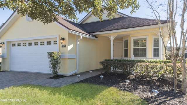 view of front of home with a garage