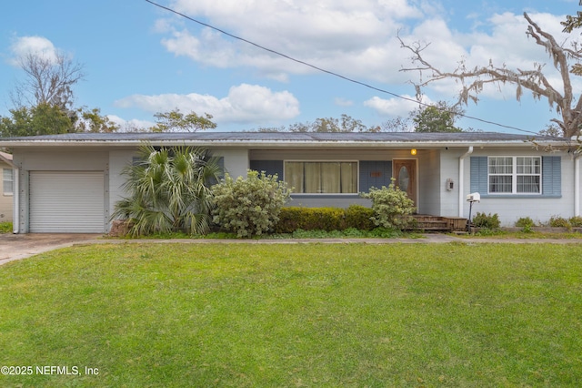 single story home featuring a front lawn and a garage