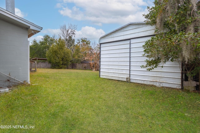 view of yard with a storage shed