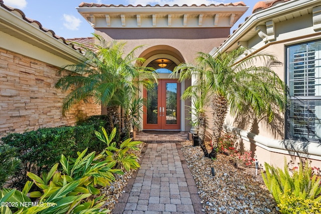 doorway to property with french doors