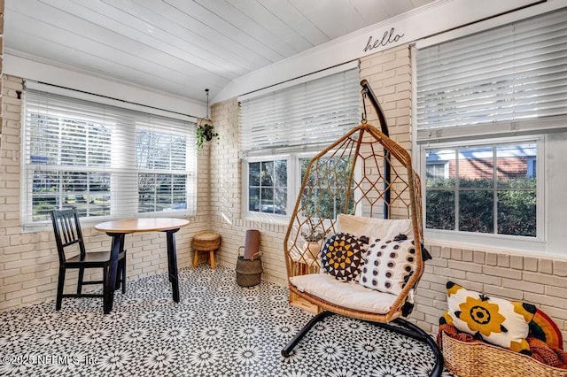 sunroom / solarium with vaulted ceiling and wooden ceiling