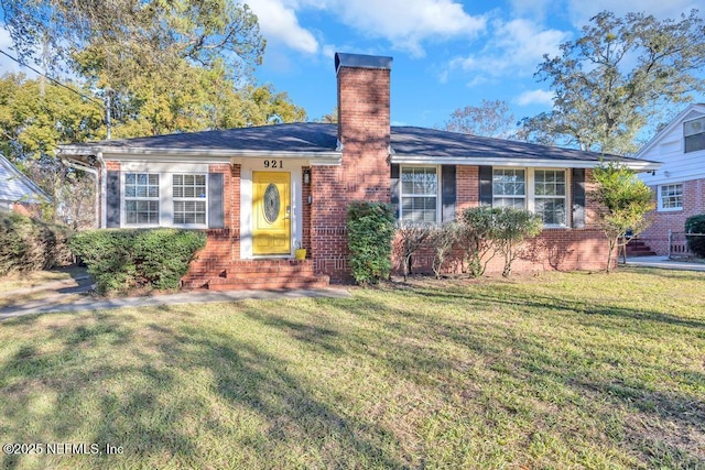 ranch-style house with a front yard