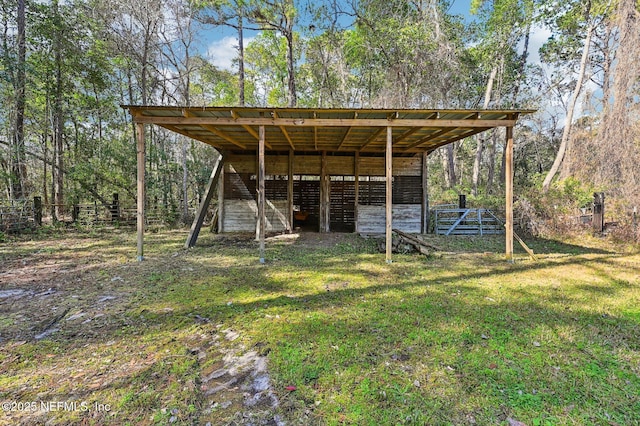 view of outdoor structure featuring a yard