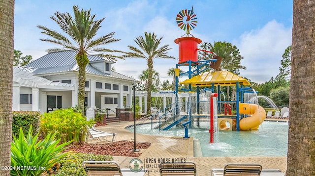 view of play area featuring a pergola