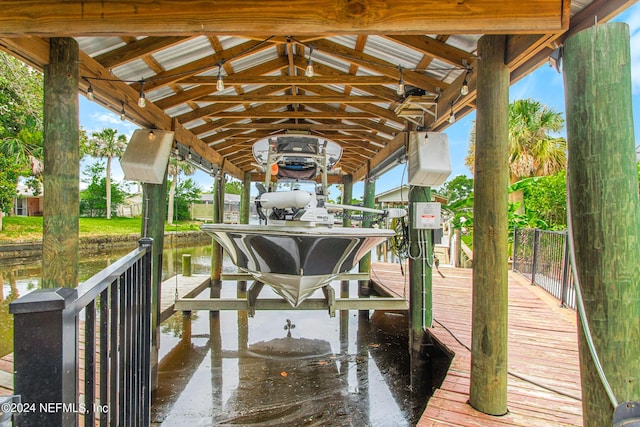 view of dock with a water view