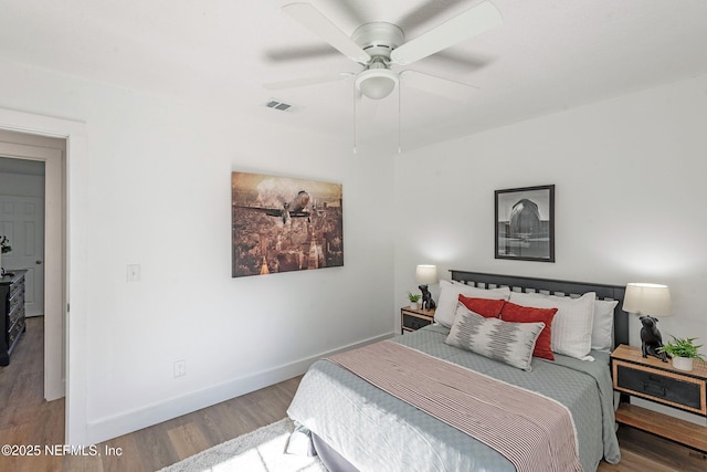 bedroom featuring ceiling fan and light hardwood / wood-style floors