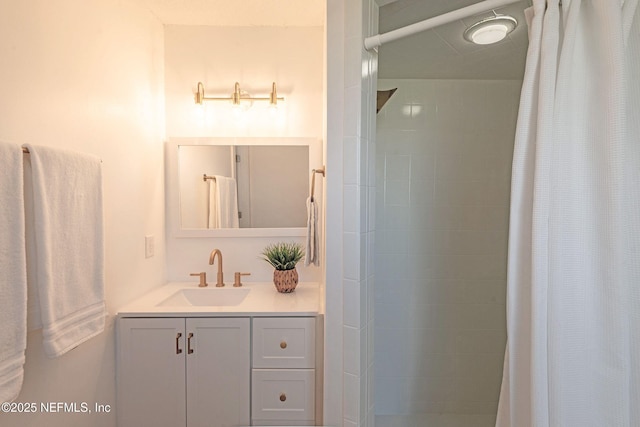 bathroom featuring vanity and walk in shower