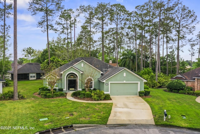 ranch-style house with a front lawn and a garage