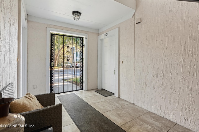 view of tiled entrance foyer