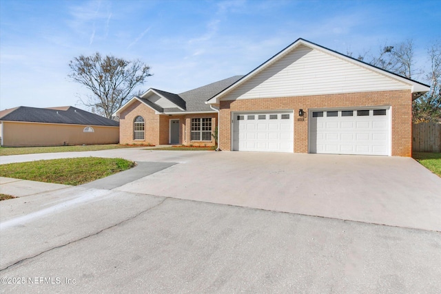 ranch-style house featuring a garage