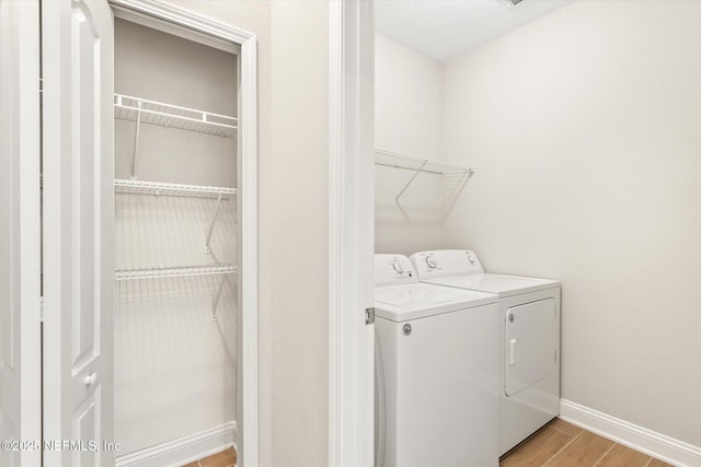 laundry area with washer and dryer