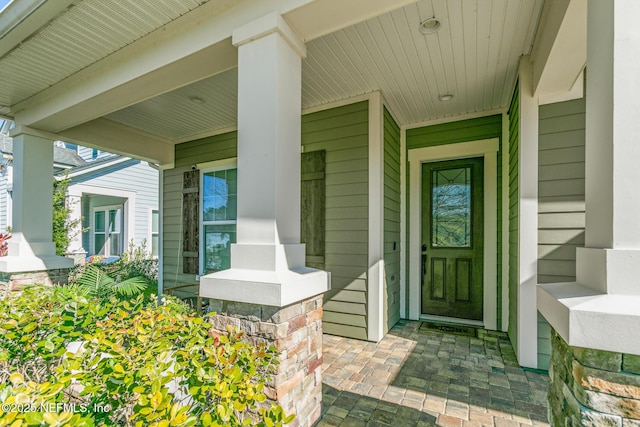 property entrance with a porch