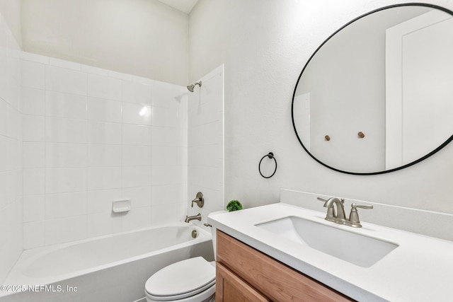 full bathroom with toilet, vanity, and bathtub / shower combination