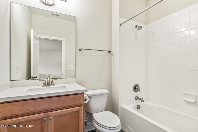 full bathroom featuring shower / bathing tub combination, toilet, and vanity