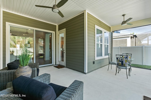 view of patio featuring ceiling fan