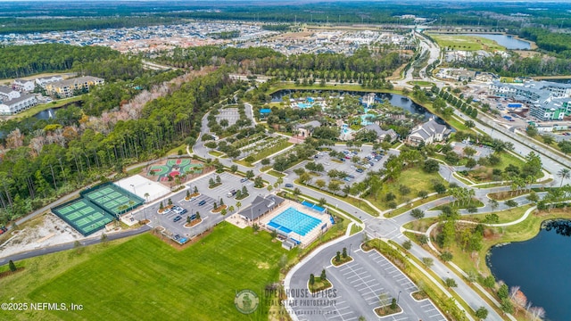 birds eye view of property featuring a water view