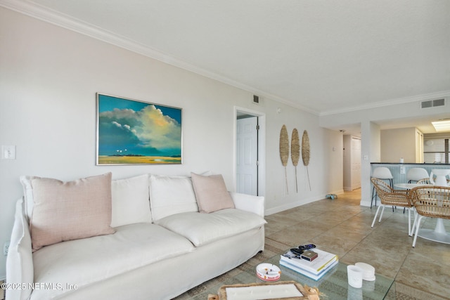 living room featuring tile patterned flooring and crown molding