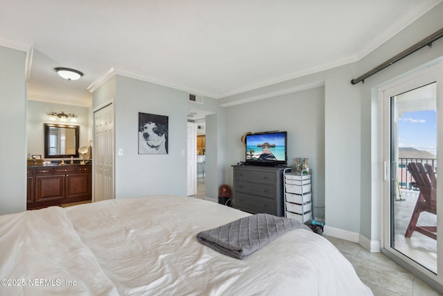 tiled bedroom featuring access to outside, connected bathroom, crown molding, and a closet