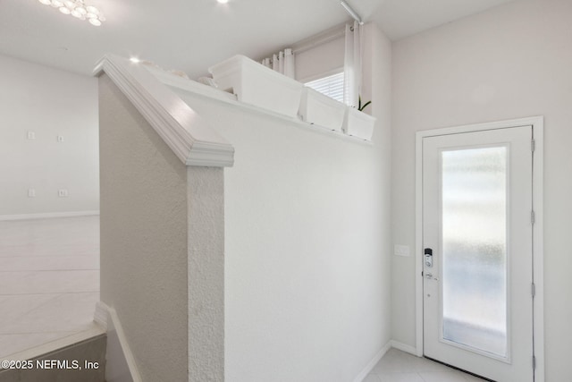 entryway featuring light tile patterned floors