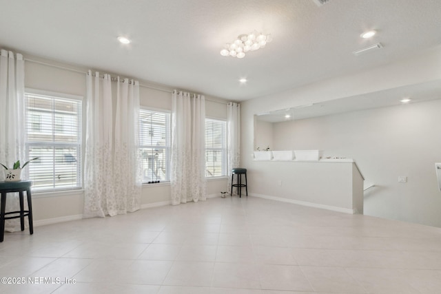 view of tiled spare room