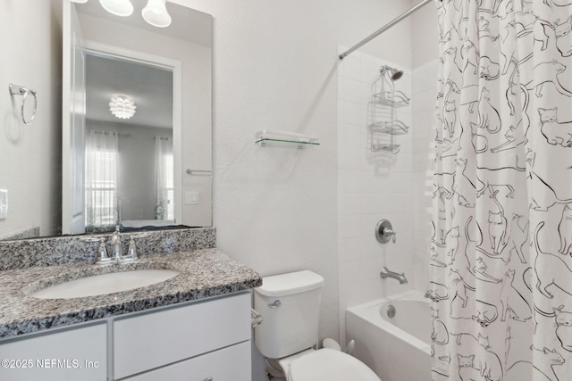 full bathroom featuring shower / bathtub combination with curtain, vanity, and toilet